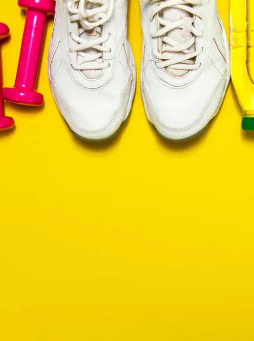 Healthy lifestyle, food, sport or athlete's equipment on bright background. Flat lay. Top view with copy space.